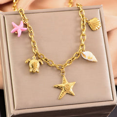 starfish turtle conch gold necklace