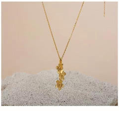 triangle forget me not necklace